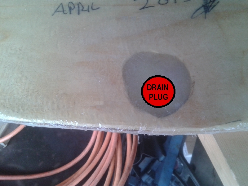 Name:  PIC SHOWING DRAIN PLUG AND EPOXY & GLASS AREA.jpg
Views: 197
Size:  320.4 KB